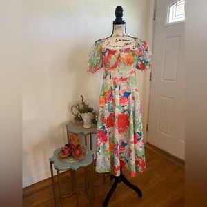 Floral Dress with built-in padded bra. Smacking back with puff sleeve.
